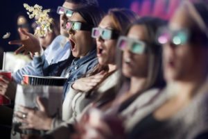 Audience Watching  Movie with 3-d glasses.